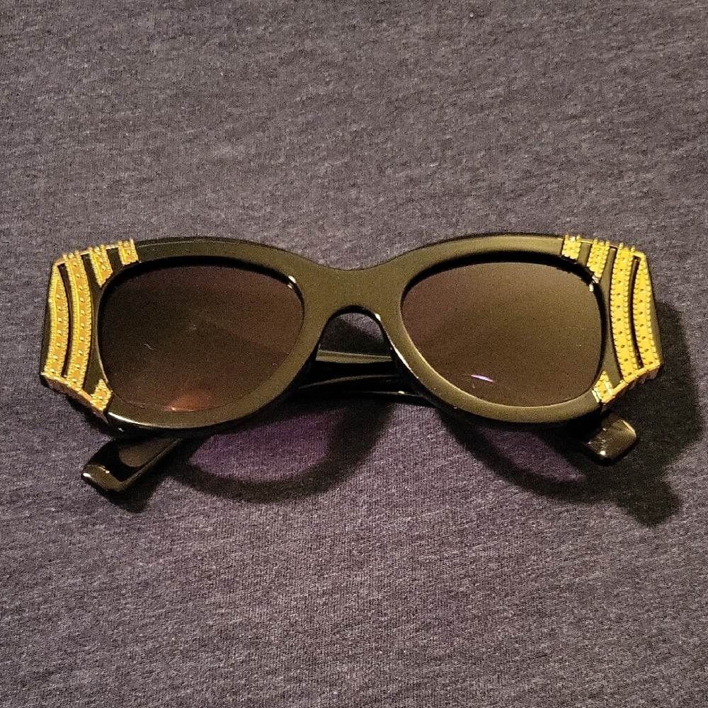 Stylish Black Sunglasses with Gold Accents